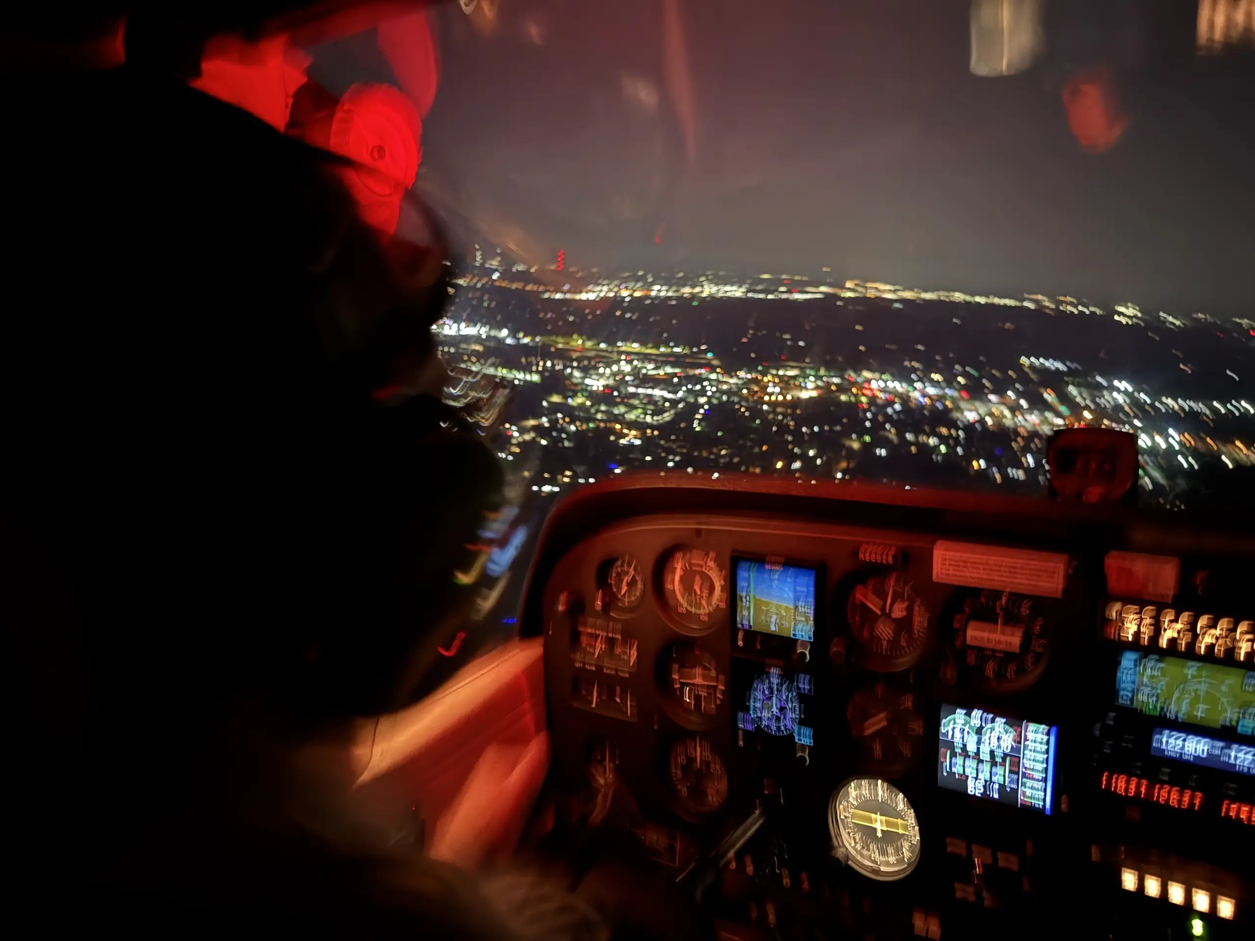 Night cockpit view during a Dayton Aviation Services training flight