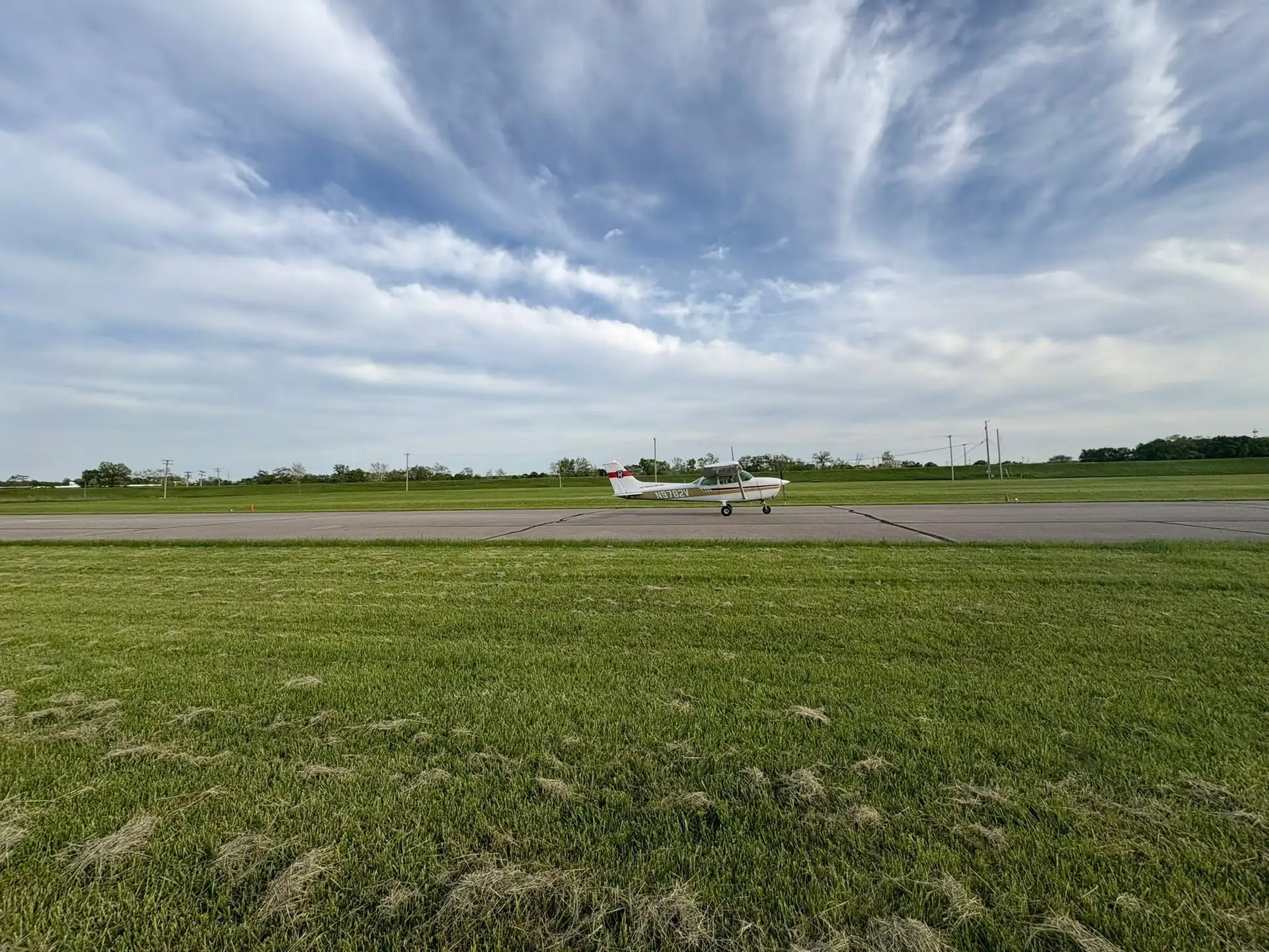 Cessna 172 taxiing at Moraine Airpark during flight training